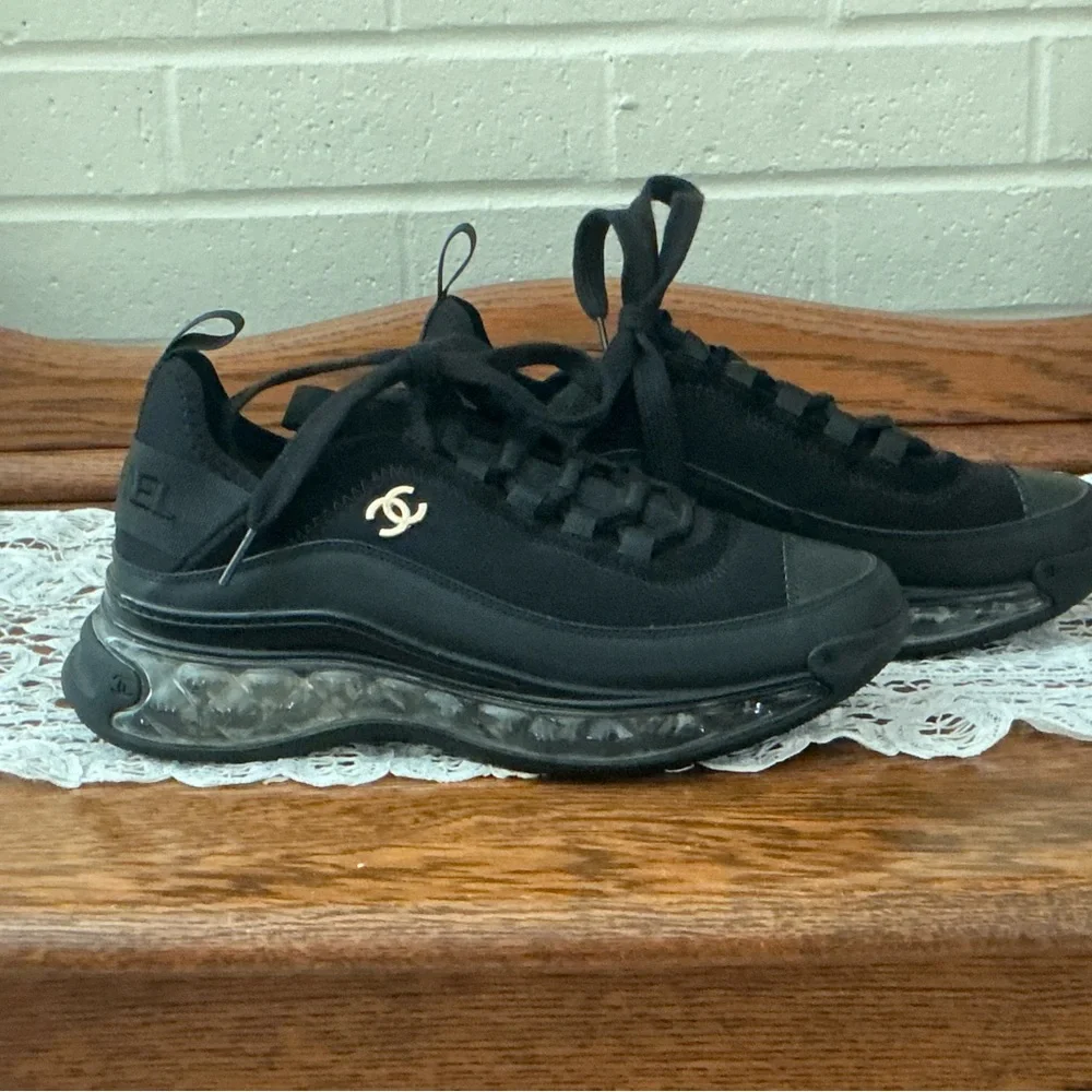 CHANEL Black Women’s Sneakers with Gold Logo